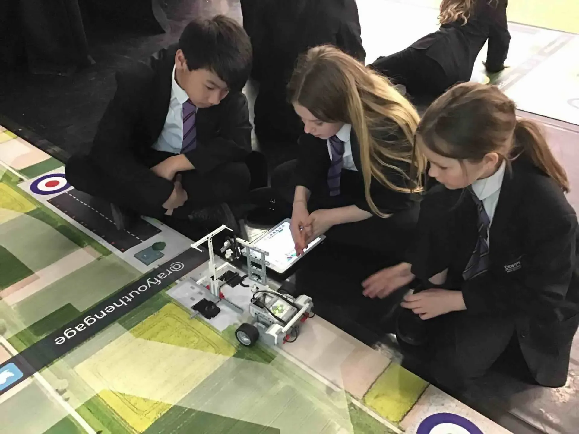 Students enjoying a funded STEM workshop session