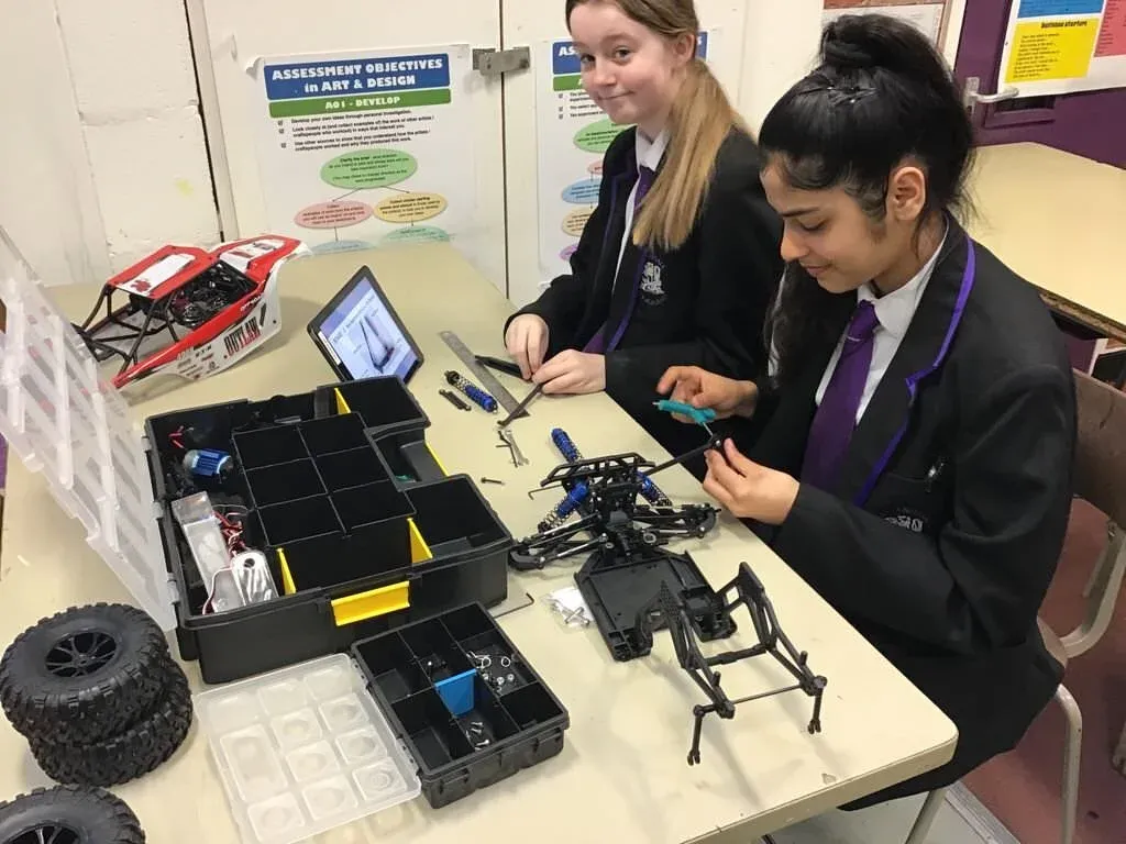 Students exploring STEM concepts during a workshop