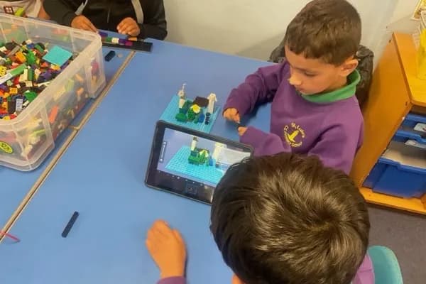 Students creating stop-motion animations with LEGO