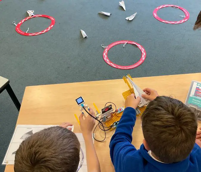 A pupil adjusting an AI launcher