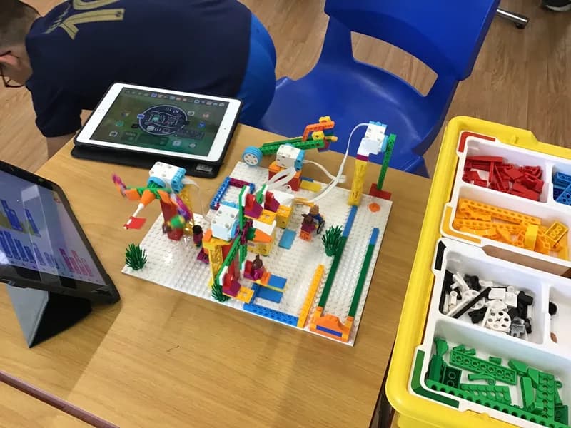 Children taking part in a hands-on STEM activity during a holiday programme