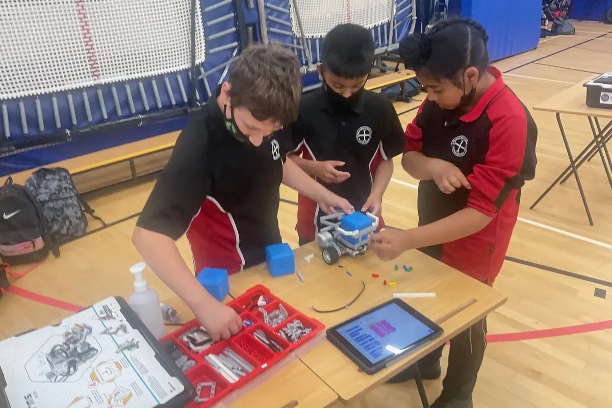 Students taking part in a hands-on STEM activity during a transition day