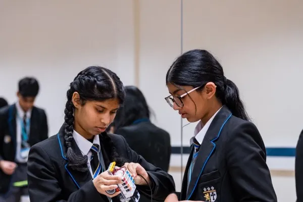 Students learning about artificial intelligence in a workshop